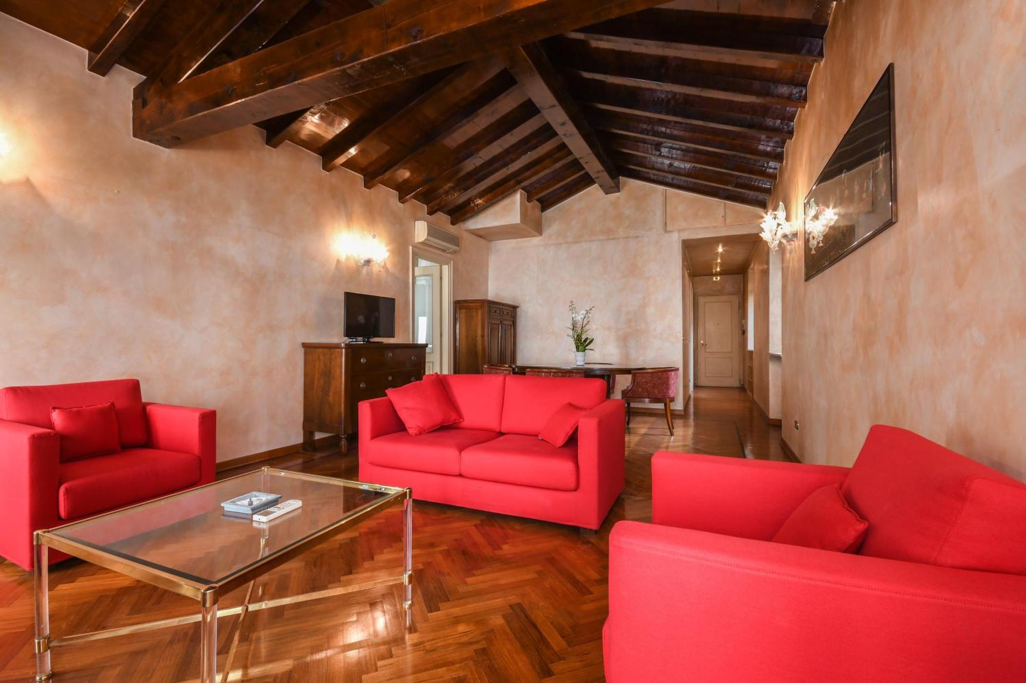Hotel Vittoria Brescia Exterior photo A living room in a suite at the Hotel Excelsior